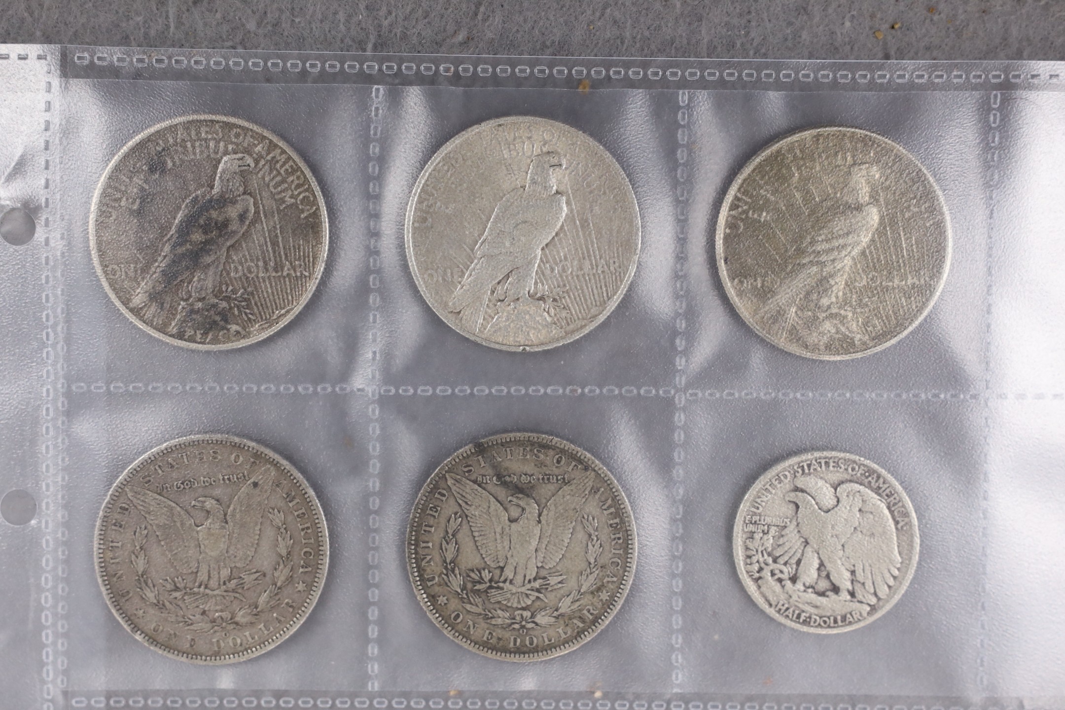 U.S.A. coins, five Morgan dollars 1878, 1888, 1891, 1895 and 1921, three other dollars 1924, 1925